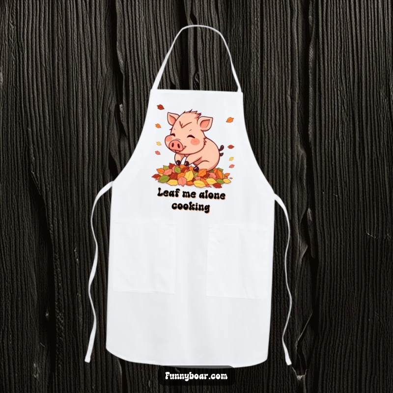Funny Apron: A rosy-cheeked small boar playfully tumbles into a pile of autumn leaves, a cheerful kitchen accessory.